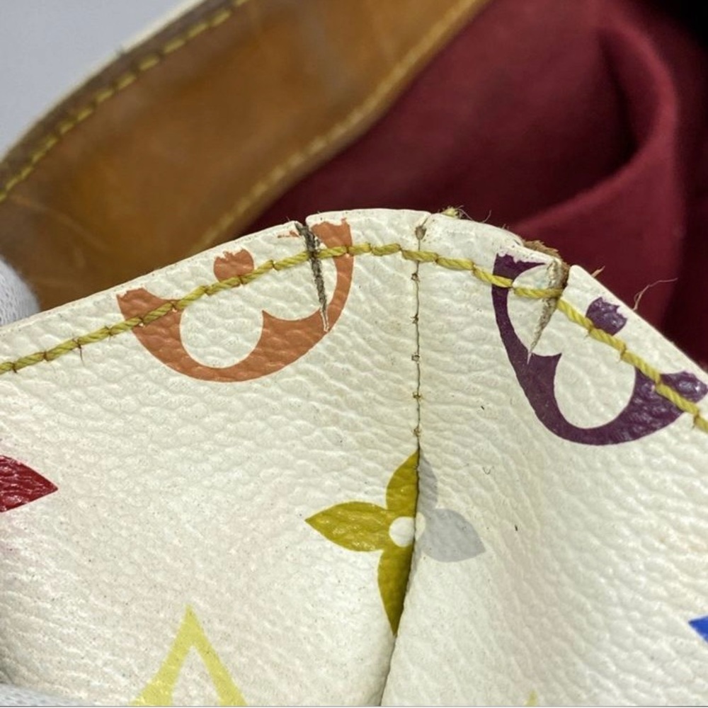 Louis Vuitton
x Takashi Murakami Monogram Multicolore Audra Authenticated white - Picture 9 of 16